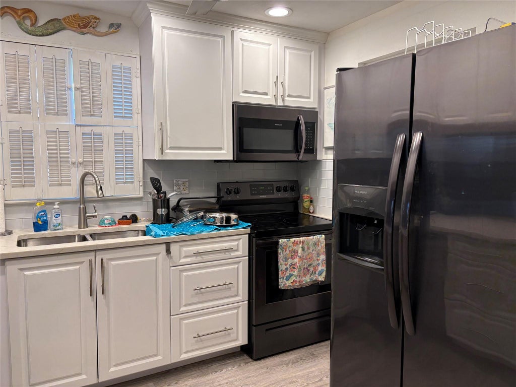 Photo of 2316 S Cypress Bend Drive #318, Pompano Beach, FL 33069 (MLS # F10478859)