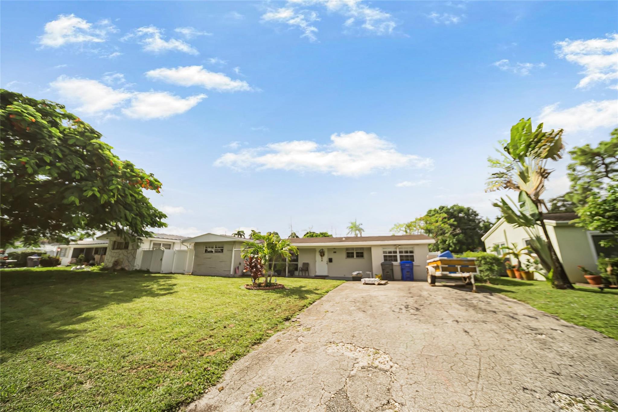 Look no further!! Come see this updated 4 bedroom 2 bath pool home in the heart of Hollywood. Features include new tile floor throughout, updated kitchen with stainless steel appliances, updated bathrooms, freshly painted, fully fenced backyard, big yard, newer flat roof. This one will not last!