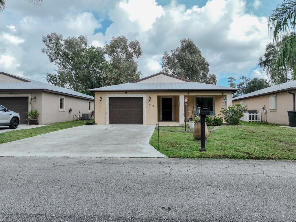 Photo of 16 MEDITERRANEAN Boulevard S, Port Saint Lucie, FL 34952 (MLS # B26079488)