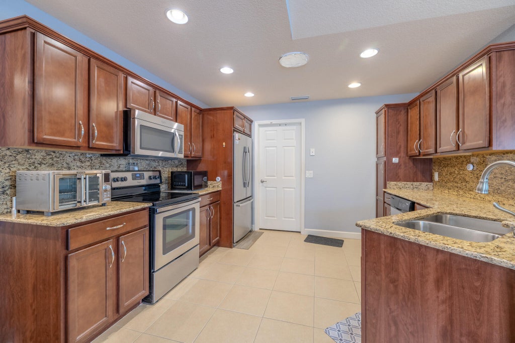 Photo of 16 MEDITERRANEAN Boulevard S, Port Saint Lucie, FL 34952 (MLS # B26079488)