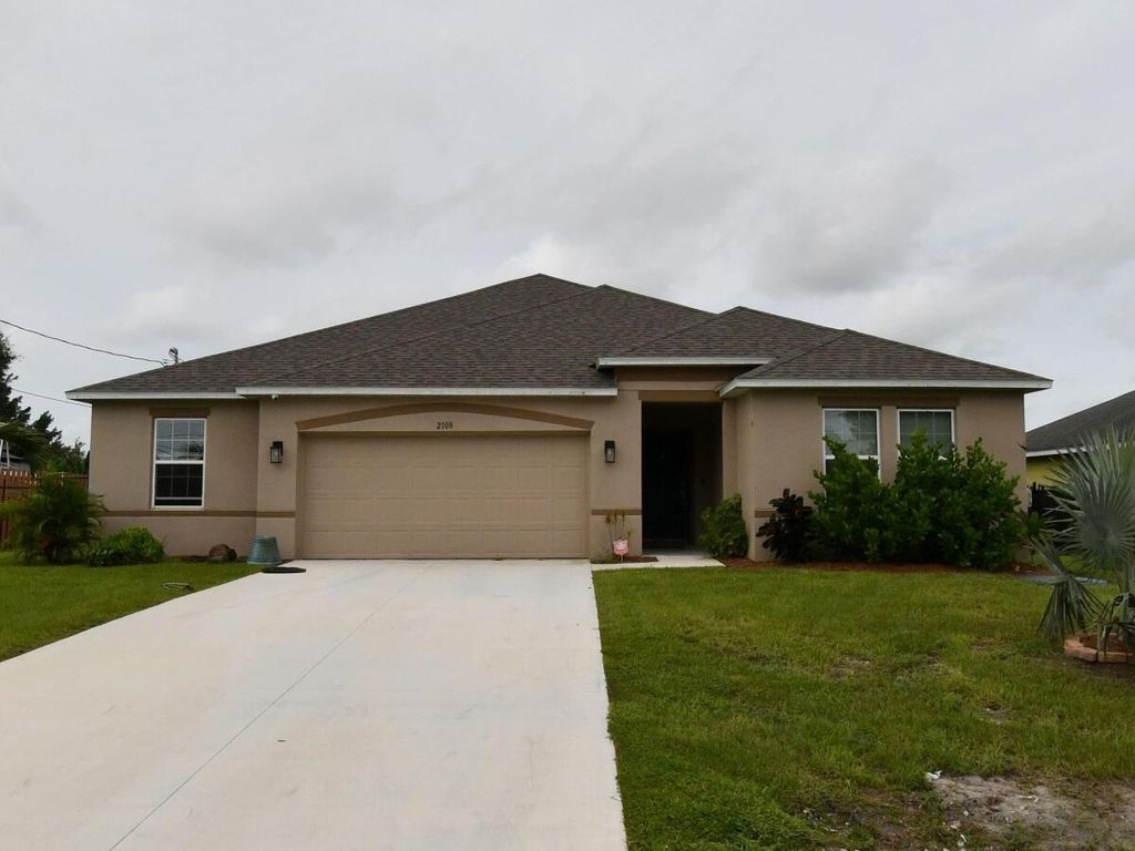 Photo of 2108 SW Monterrey Lane, Port Saint Lucie, FL 34953 (MLS # R11143821)