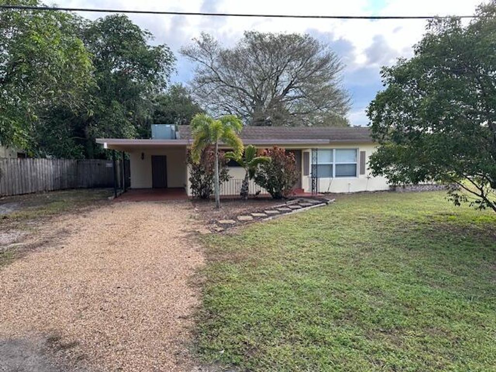 Photo of 1238 W Shore Drive, West Palm Beach, FL 33406 (MLS # R10948070)