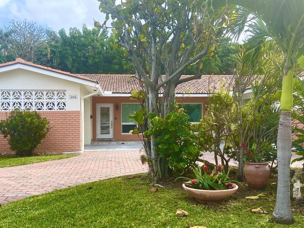 Photo of 266 NE Wavecrest Way, Boca Raton, FL 33432 (MLS # R11149293)