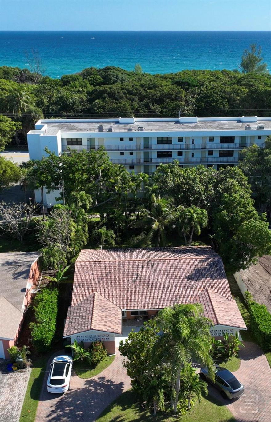 Walk to the beach! This Beautifully updated 2/2 duplex with a carport is waiting for you. So many updates including white shaker cabinets, granite countertops, neutral beach inspired backsplash, new window treatments, bathroom vanities and neutral paint throughout. Enjoy the privacy of the thriving foliage in your backyard oasis with your private deck. This unfurnished ground level home is just a block from the beautiful Boca Raton South Beach Park. Take a short walk to a beachfront bluff paved walkway through to Red Reef, Spanish River Park and to Gumbo Limbo nature walkway. Take a stroll to the restaurants and shops on Palmetto Pk Rd. Just a short distance to Mizner and Royal Plaza shops with a variety of restaurants. One year minimum rental but welcome long term tenants.