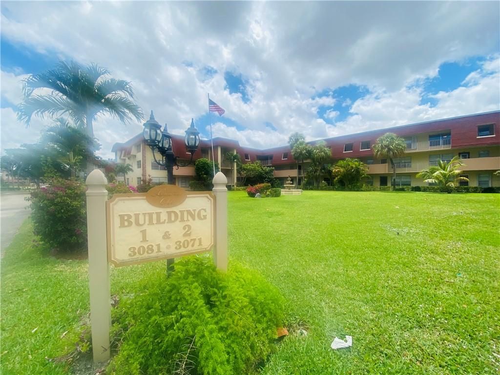 Photo of 3081 NW 47th Ter #306, Lauderdale Lakes, FL 33313 (MLS # F10282148)