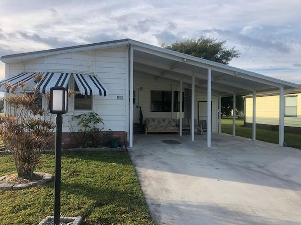 Photo of 511 Natalie Drive Dr, Port St Lucie, FL 34952 (MLS # R10716580)