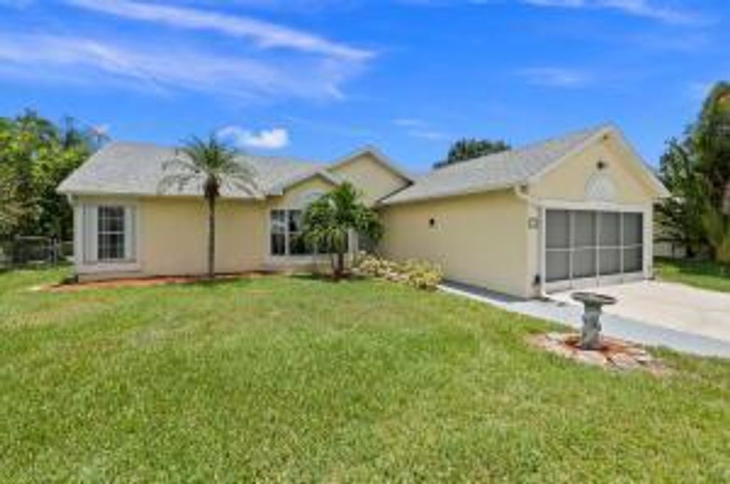 Photo of 441 SE Evans Avenue, Port St Lucie, FL 34984 (MLS # R10901167)