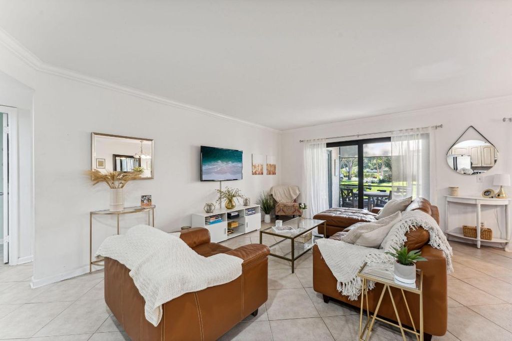 Photo of 5580 Coach House Circle #C, Boca Raton, FL 33486 (MLS # R11053295)