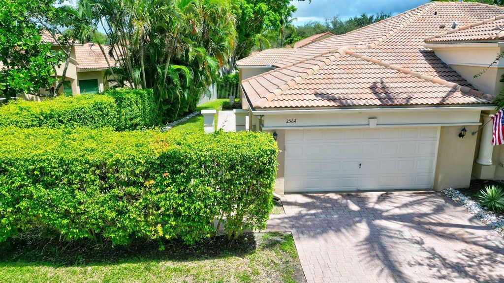 Photo of 2564 Sandy Cay, West Palm Beach, FL 33411 (MLS # R11022030)