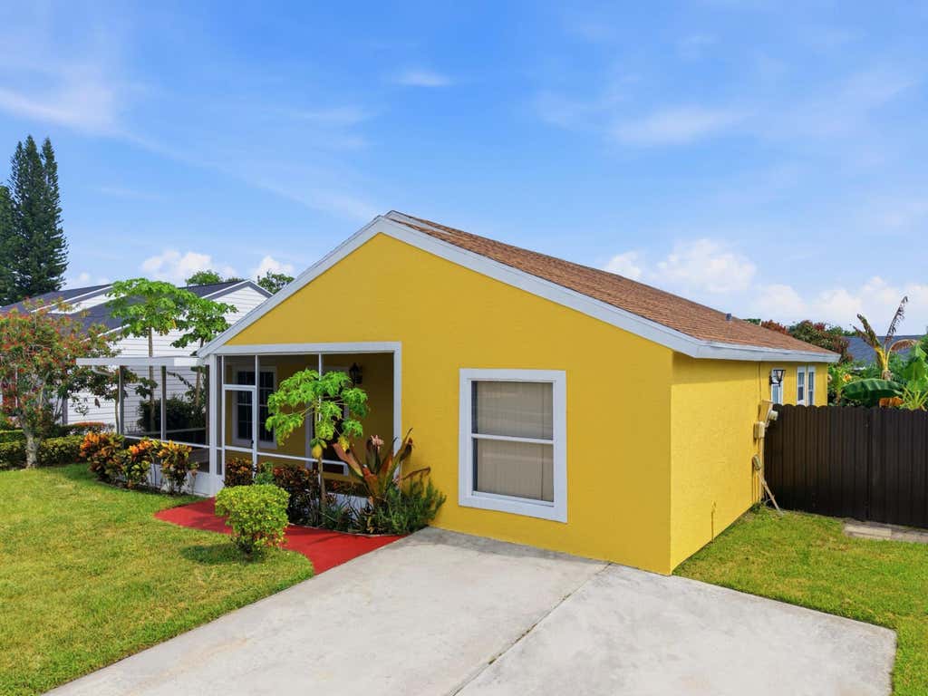 Photo of 7702 Blairwood Circle S, Greenacres, FL 33467 (MLS # B26068097)