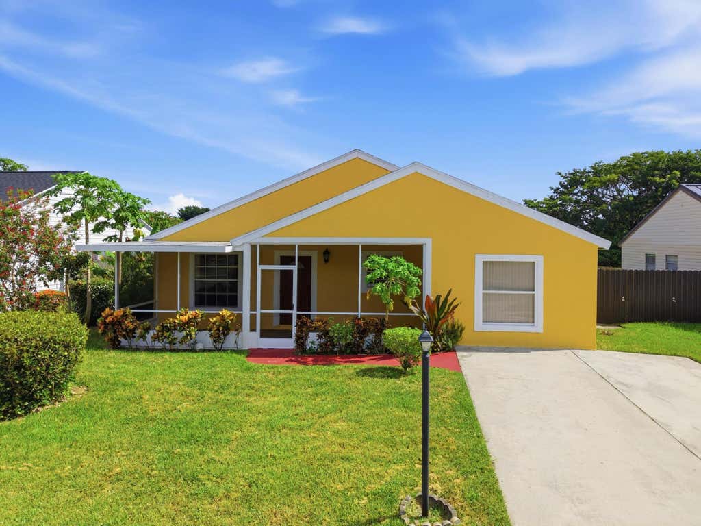 Photo of 7702 Blairwood Circle S, Greenacres, FL 33467 (MLS # B26068097)