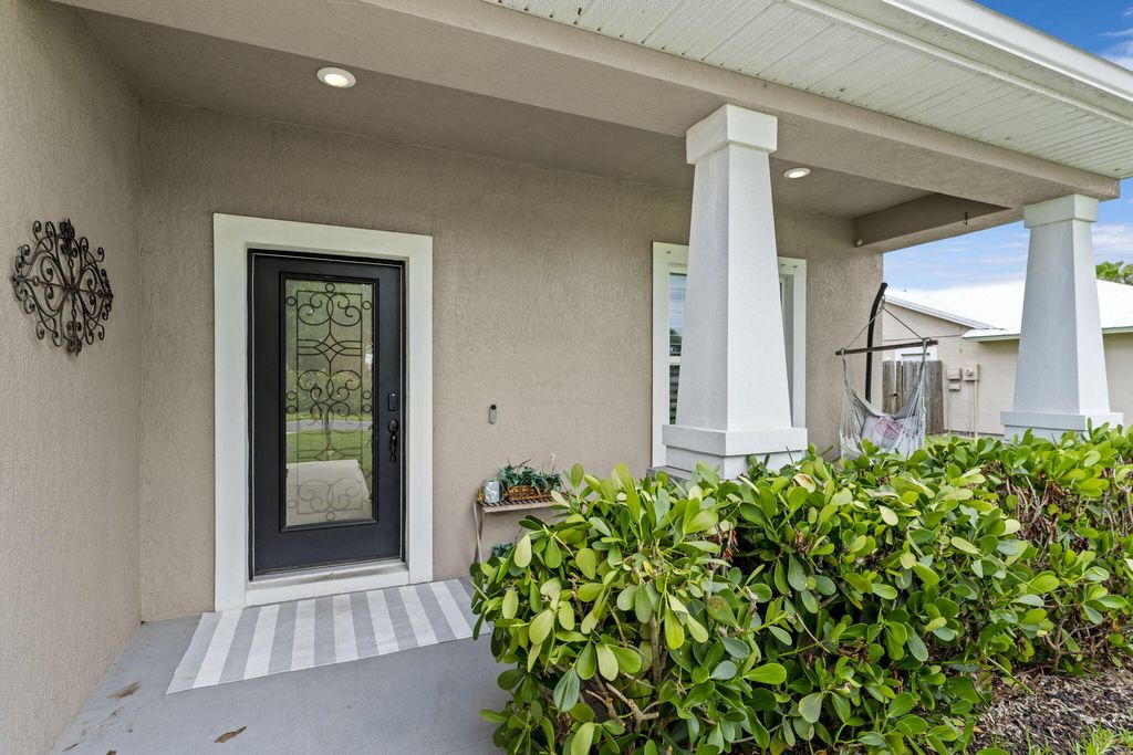 Photo of 2241 SW Abalon Circle, Port Saint Lucie, FL 34953 (MLS # B26045975)