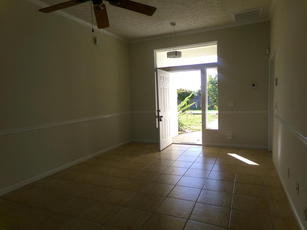 Photo of 4101 SW Mccrory Street, Port Saint Lucie, FL 34953 (MLS # R11032695)