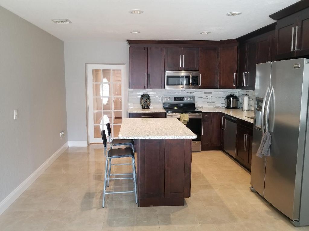 Photo of 5209 Cannon Way, West Palm Beach, FL 33415 (MLS # R11126818)