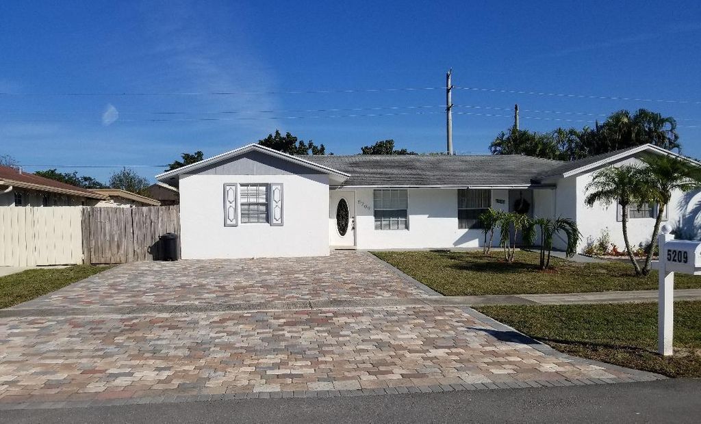 Photo of 5209 Cannon Way, West Palm Beach, FL 33415 (MLS # R11126818)