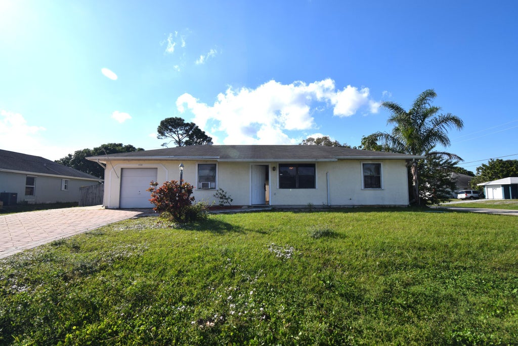 Photo of 1102 SW Hibiscus Street, Port Saint Lucie, FL 34983 (MLS # B26077971)