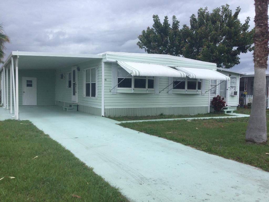 Photo of 40 Monterey Way, Port Saint Lucie, FL 34952 (MLS # R11090150)