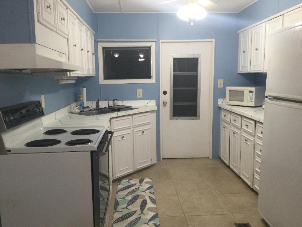 Photo of 40 Monterey Way, Port Saint Lucie, FL 34952 (MLS # R11090150)