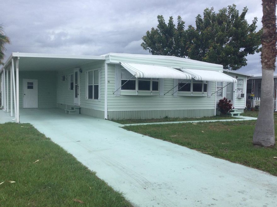 Seller financing available on this recently refurbished home in the 55 plus community of Spanish Lakes.  Home has all new flooring throughout, updated baths, roof  has new sealant, new water heater, recently service ac unit now on a service plan.  Move right into this home and enjoy all that Spanish Lakes has to offer. Land lease covers taxes, trash removal, lawn care and sewer.  Amenities include two pools, shuffleboard, tennis, pickleball, bocce, billiards, ping pong, community room, party room, fitness room, library and much much more.  Future residents must be approved by Spanish Lakes.  Call for application.