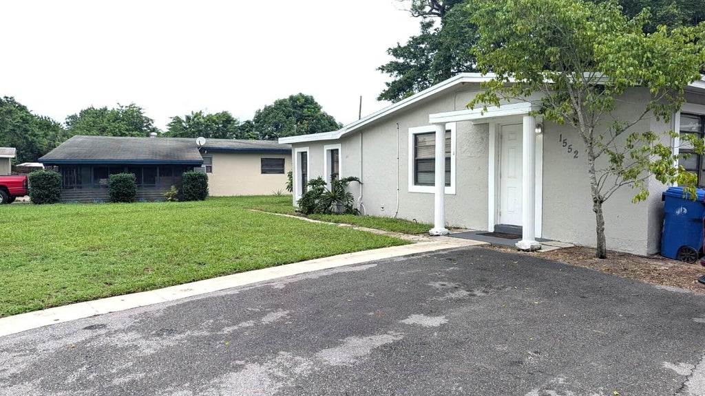 Photo of 1552 NW 15TH Terrace, Fort Lauderdale, FL 33311 (MLS # B26082177)