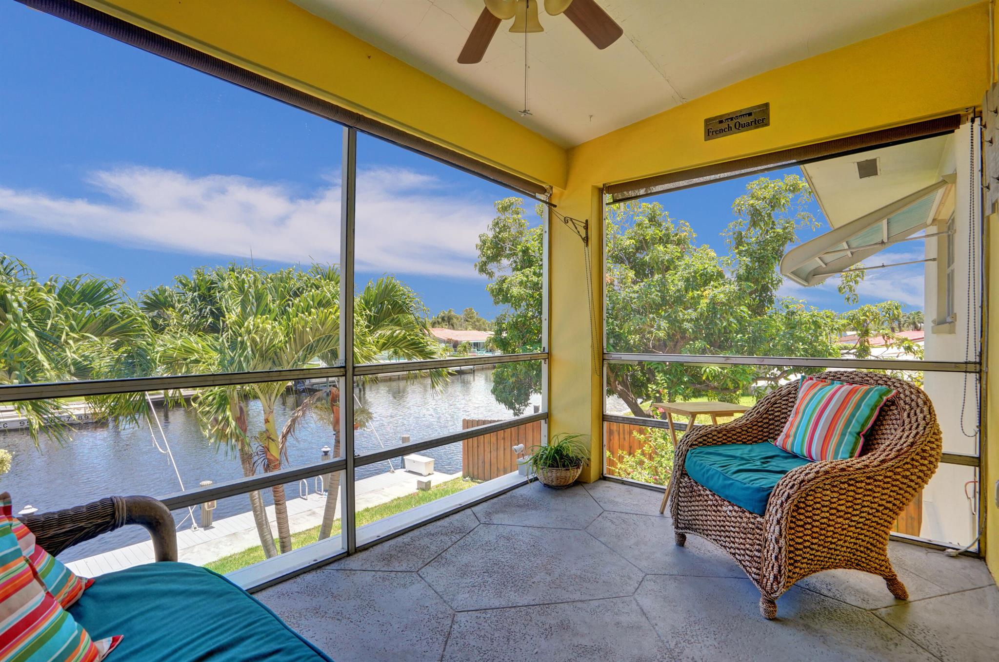 A boater's dream! Best waterfront value around. Tastefully updated, 2 br, 2 bath, waterfront property with gorgeous, wide open water-views. This spacious, corner-unit features a fully renovated kitchen with stainless steal appliances, two full bathrooms, a Murphy bed in the second bedroom, a screened-in balcony overlooking the tranquil canal as well as a spacious front porch. Only one fixed, tall bridge (federal hwy) to the Intracoastal and ocean access. Dockage for rent available, up to 25 foot boat. Brand new roof, new AC, New electric panel, new washer and dryer. The community is beautifully maintained and the building has its own dedicated pool. The property is a co-op with another 32 years left on its land lease. Cash purchases only. All ages permitted. No rentals allowed.