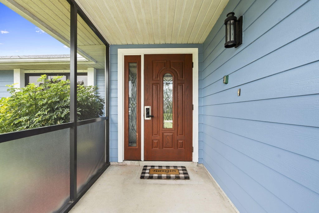 Photo of 1001 SW Canary Terrace, Port Saint Lucie, FL 34953 (MLS # B26058361)