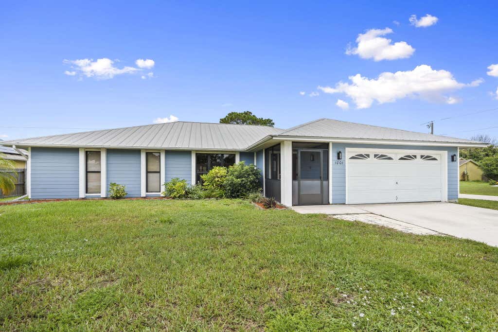Photo of 1001 SW Canary Terrace, Port Saint Lucie, FL 34953 (MLS # B26058361)