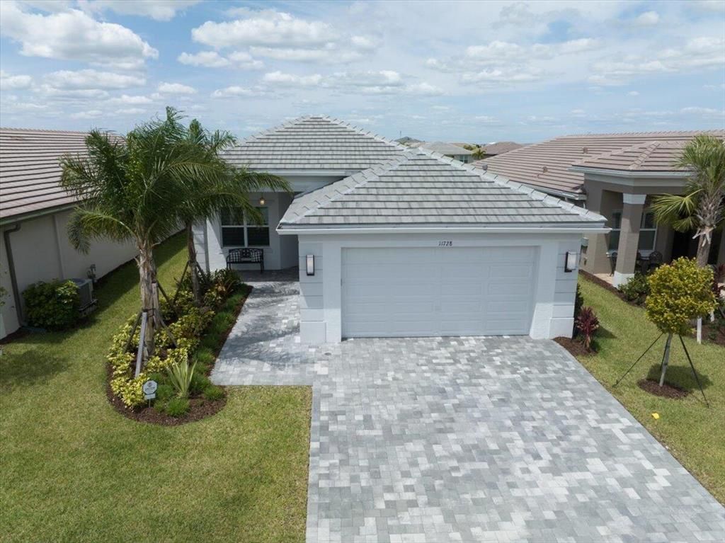 Photo of 11728 SW Moon River Way, Port St Lucie, FL 34987 (MLS # R10881751)