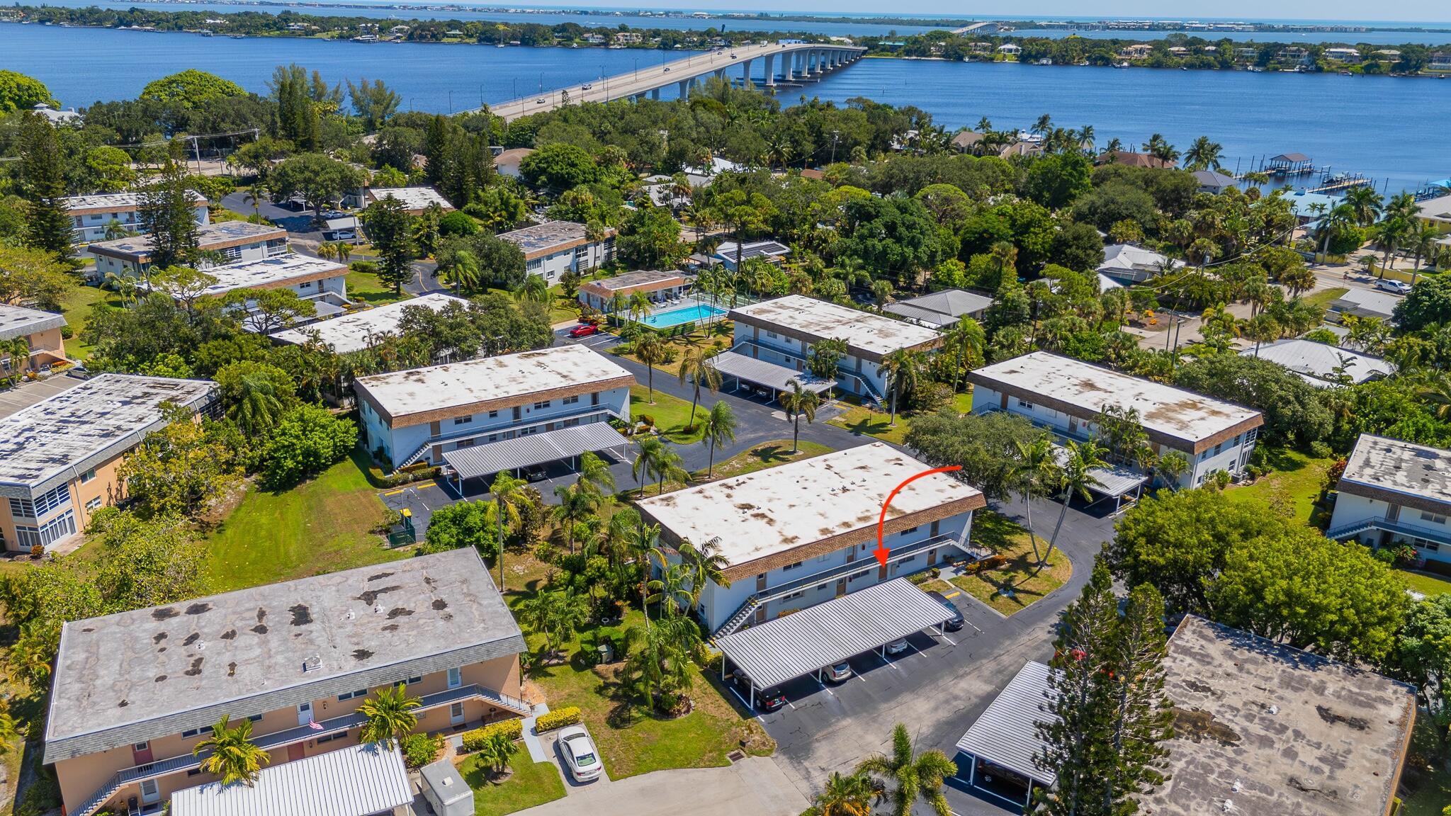 Enjoy the Florida Beaches and Breezes in this Desirable 2 Bedroom, 2 Bathroom, 1st Floor Kingswood Unit. Unit Feature's: Modern Updates, Perfect Location, Light and Bright, Immaculate, Updated/ Upgraded, Vinyl Floors Throughout, Updated Baseboards, Lanai with Brand New Wall-to-Wall Screen, Accordion Hurricane Shutters, Covered Parking Spot, Washer/Dryer Next Door. Kingswood Offers an Active 55+ Neighborhood with Clubhouse, Social Events, Community Pool and Shuffleboard. Cable, Internet, Water, Sewer and Trash Are All Included. Beaches are Only 3 Miles Away and Downtown Stuart Is Only 2 Miles Away! Lots of Shopping and Dining Options Close By!