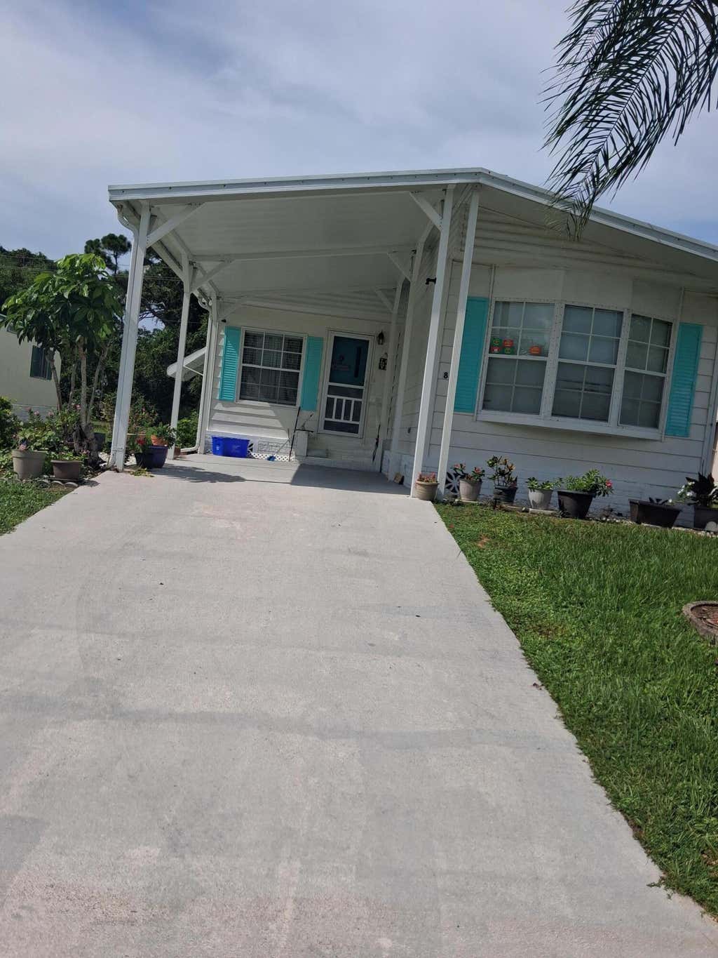 Photo of 8 Novedades, Port Saint Lucie, FL 34952 (MLS # B26062341)