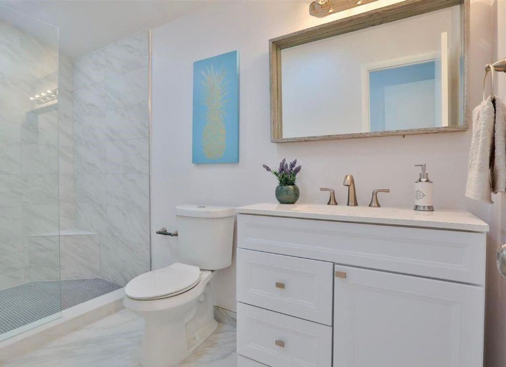 Photo of 735 NE 37th Street #A, Oakland Park, FL 33334 (MLS # F10556256)