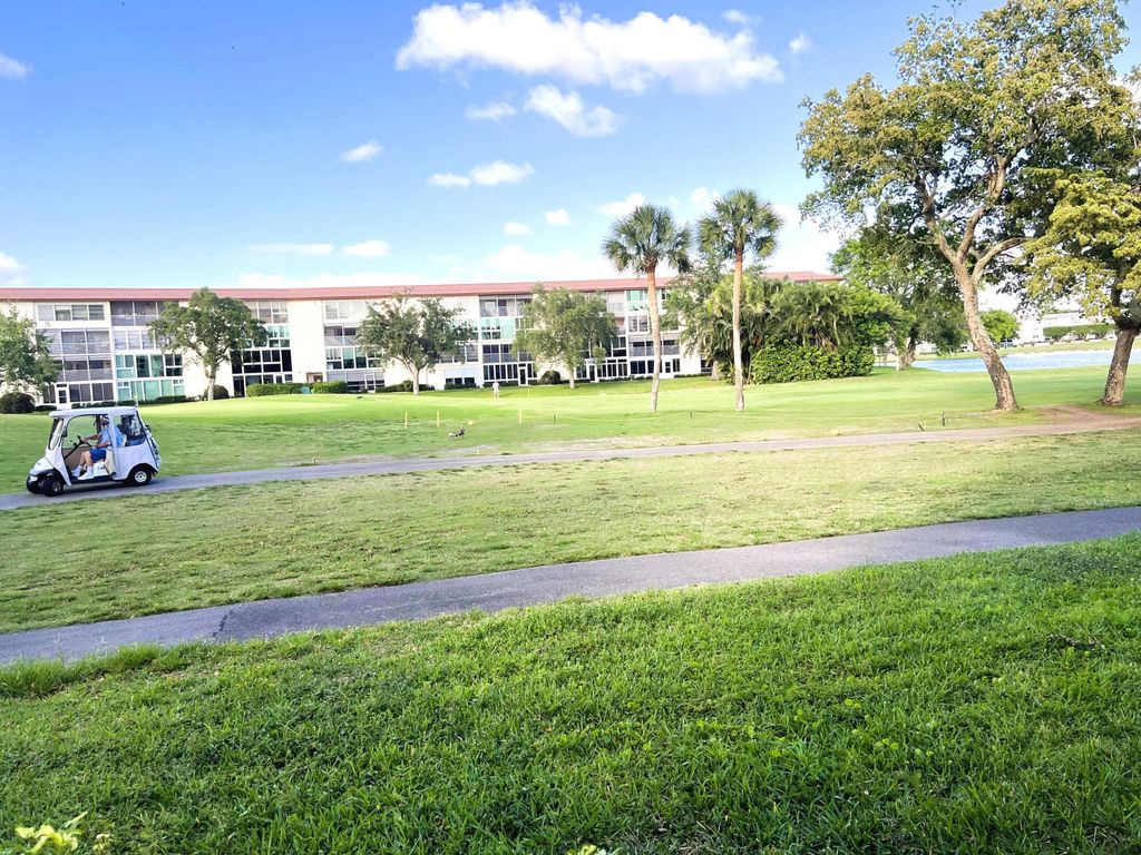 Photo of 2902 Victoria Circle #A1, Coconut Creek, FL 33066 (MLS # B26020411)