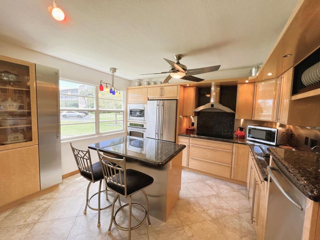 Photo of 2902 Victoria Circle #A1, Coconut Creek, FL 33066 (MLS # B26020411)