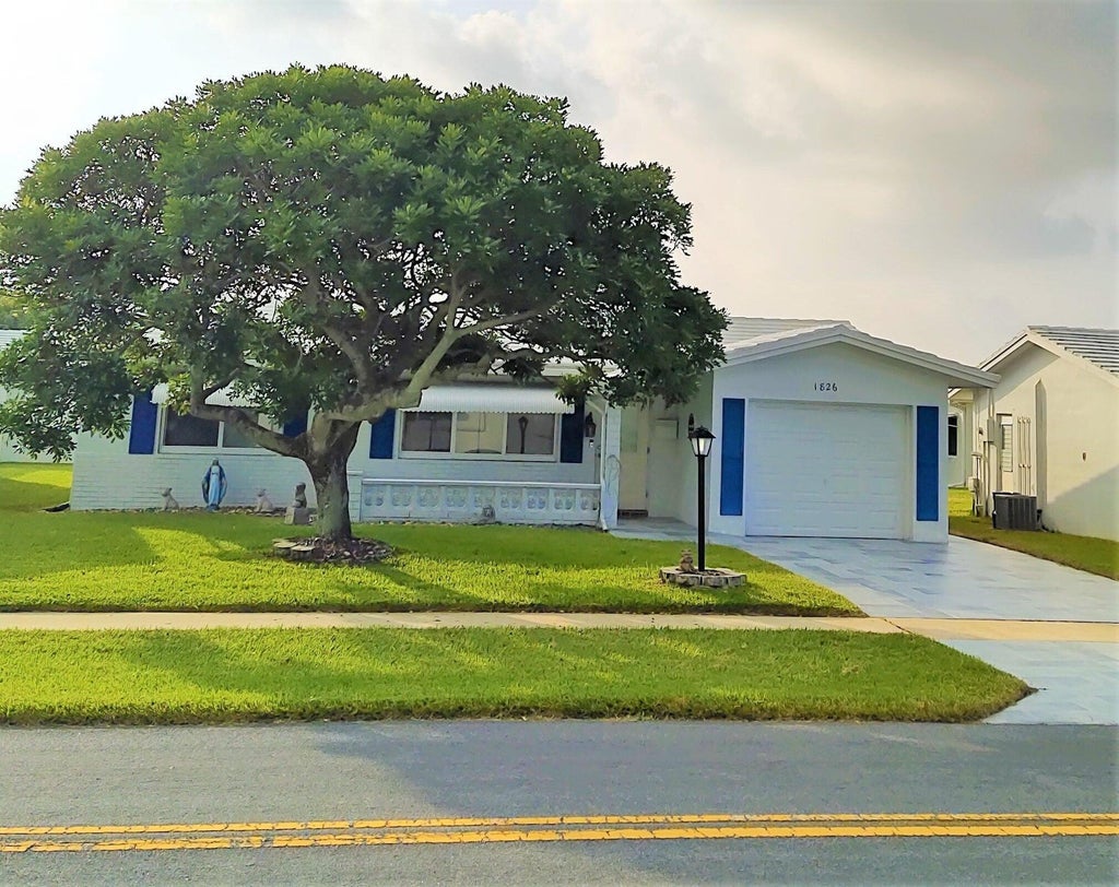 Photo of 1826 SW Congress Boulevard, Boynton Beach, FL 33426 (MLS # B26044028)