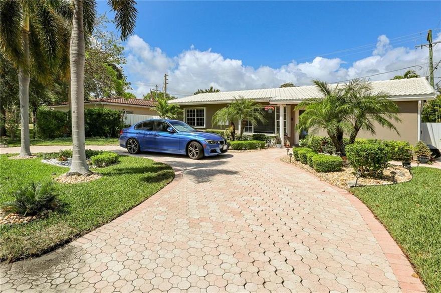 BACK UP OFFERS ONLY! Gorgeous beautifully landscaped 3/2.5 plus den in desirable Lighthouse Point. Totally renovated in last 3 years. Bright and sunny with neutral color, tiled throughout makes for easy living, and great for entertaining. Enjoy custom designed, large gourmet kitchen features tons fo storage,SS appliances,3 ovens, quartz counters, glass backsplash, and walk in pantry with extra refrigerator. Huge master bedroom with walk in closet, fully tiled master bath featuring double vanity and opal counter . Two oversized bedrooms and detached den offers room for guests or office/studio. Crown molding throughout. All upgraded electric and plumbing, tankless water heater, alarm system.SS full size washer-dryer.Backyard oasis with large pool & new stonework.  BACK UP OFFERS ONLY
