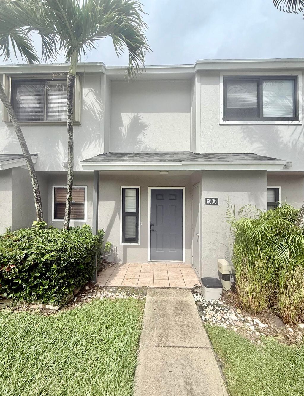 Photo of 6606 Dockside Circle, Greenacres, FL 33463 (MLS # B26012544)