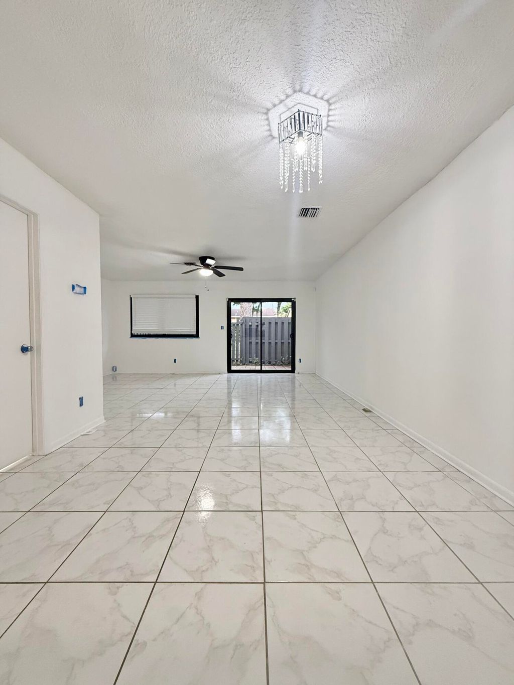 Photo of 6606 Dockside Circle, Greenacres, FL 33463 (MLS # B26012544)
