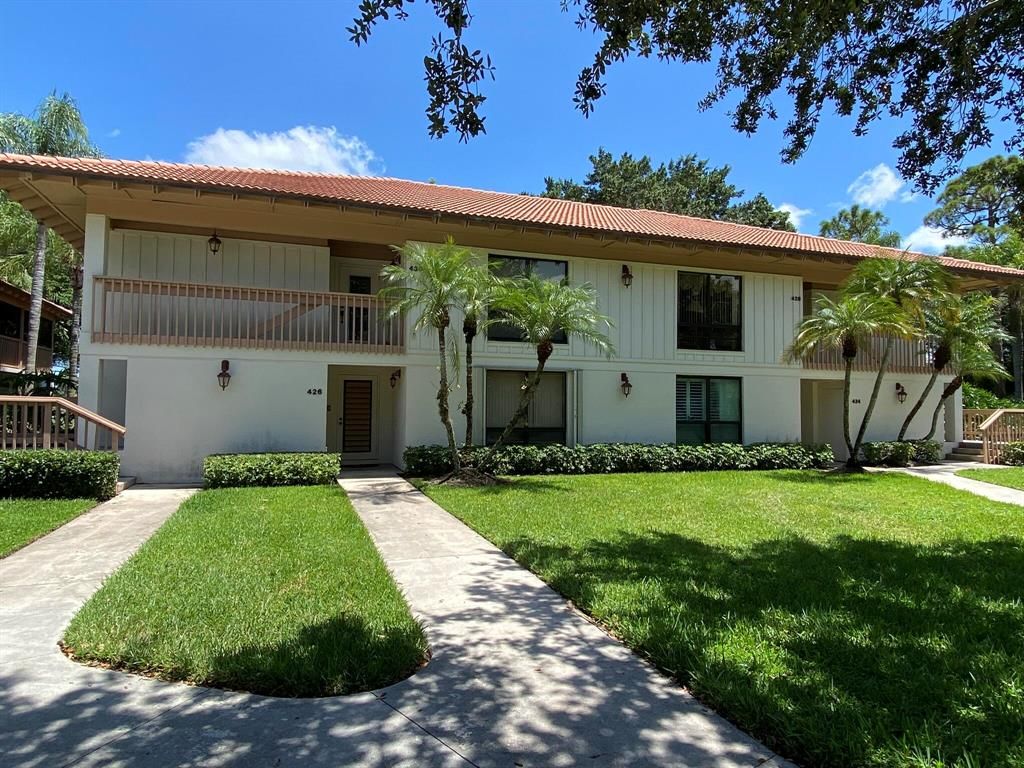 Photo of 426 Brackenwood Lane Ln S, Palm Beach Gardens, FL 33418 (MLS # R10820818)