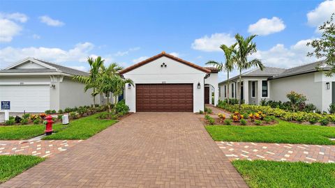 Photo of 203 SE Via Sangro, Port Saint Lucie, FL 34952 (MLS # F10538897)