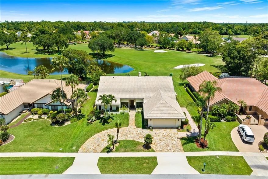 Located in sought after Boca Woods Country Club on highly desirable Old Bridge Trail. Exceptional home offers three bedrooms, plus an office, three and one half baths, two car plus golf cart garage. Property features an expansive open living area, kitchen with granite counter tops, island, counter seating, breakfast area, butlers pantry, dining room, fireplace, wet bar, cabana bath. Enjoy entertaining on the oversized patio with a pool/spa that over looks a spectacular lake and golf course view. Resort style living w/two 18 hole golf courses, tennis, pickelball, new state of the art fitness center, spa, game room, fine/casual dining & more! Mandatory membership $95,000 ($20,000 equity refundable when you sell home) paid to BWCC 10 days prior to closing. See attachments yearly dues and fees