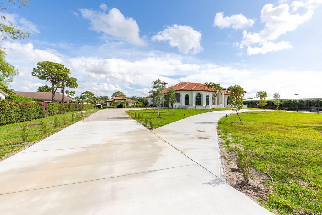 Photo of 14367 Belmont Trace, Wellington, FL 33414 (MLS # B26024024)