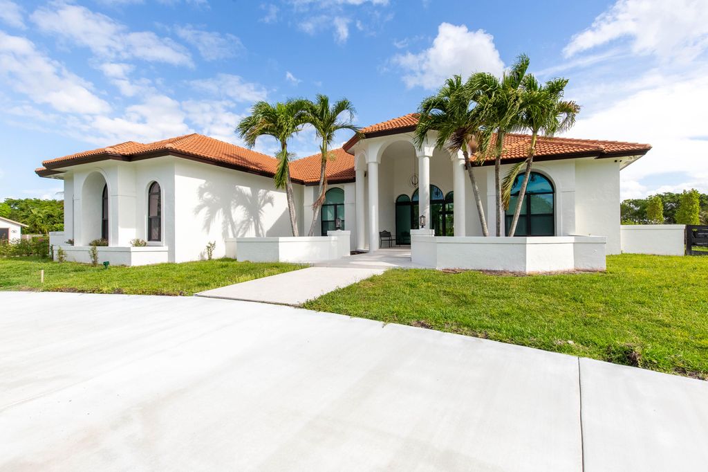 Photo of 14367 Belmont Trace, Wellington, FL 33414 (MLS # B26024024)