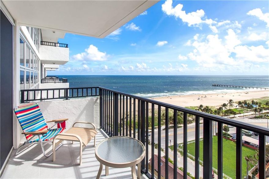 Stunning ocean and intracoastal views from this beautifully upgraded condo.  As soon as you open the door, you will be amazed at the views.  Ocean views from both bedrooms and living and dining room.  Location, location, location!  Enjoy the sunrises and the sunsets!  Floor to ceiling high impact impact windows and neutral tile throughout.  Building has been recently renovated and it is located across the street from the beach.  Close to restaurants & shopping.  BE SURE TO CLICK ON THE 3D VIRTUAL TOUR
