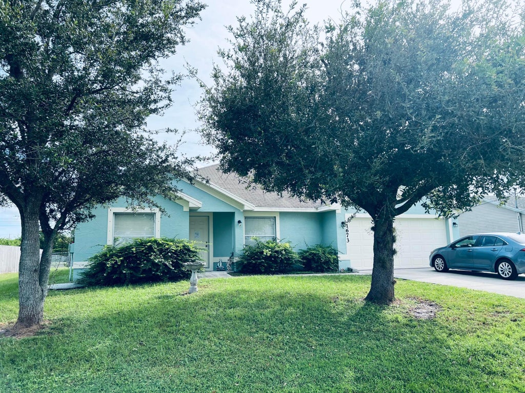 Photo of 1673 SW Hampshire Lane, Port Saint Lucie, FL 34953 (MLS # R10923167)