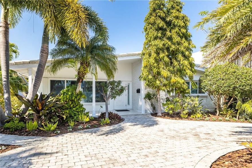 Coastal Living with a Modern Luxury approach. Welcome to 1019 Adams, a stunning contemporary home that commands attention with its distinctive style and modern swagger. Here you will find an abundance of natural light and an overall feeling of freshness. You will also appreciate the high ceilings and Italian porcelain tiles throughout the home. In the open concept kitchen you will find high end appliances and tons of storage. The flow from inside to outside is seamless. The home is situated also very well on the lot and you will find that the backyard with it's ample patio and pool area is perfect for entertaining.  Located within minutes to beach, downtown and worship the location is ideal. We welcome you to Home Adams.