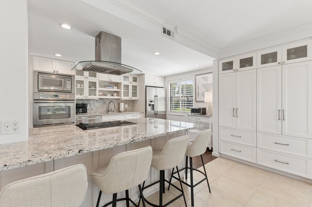Photo of 3649 S Quail Ridge Drive, Boynton Beach, FL 33436 (MLS # B26000910)