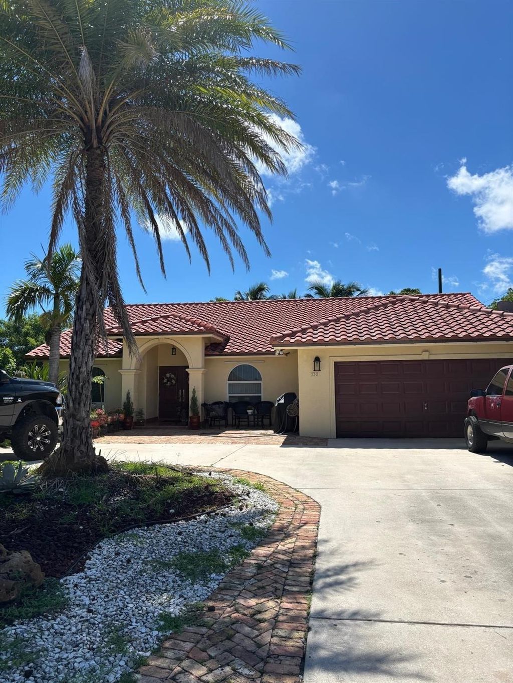 Photo of 330 SW 14th Street, Deerfield Beach, FL 33441 (MLS # F10528863)