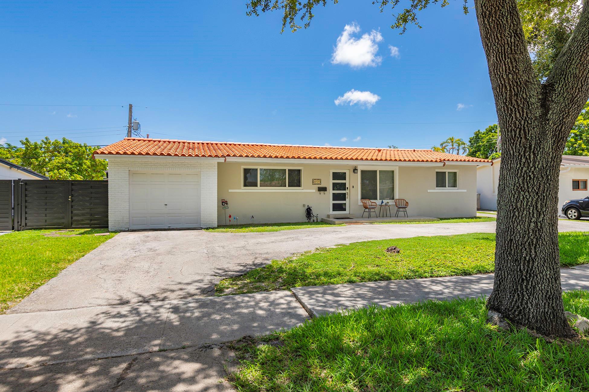 Updated 4/2 home in sought-after Miller Heights community with No HOA! Modern SMART home, full of many upgrades with pacious splitroomlayout with living rm, dining, family rm, & versatile flex space ideal for home office, gym, or storage; or as a garage. Updated kitchen features new stove, microwave, & dishwasher. Bathrooms remodeled, to include interior plumbing & new main water line outside. You'll also love the newly enhanced laundry room with new washer & dryer. Additional upgrades are impact windows & doors, modern flooring, & sleek baseboards. Remodel completed 2022-25. Large yard, room for a pool or outdoor oasis. Mere minutes to major highways and iconic Tropical Park. Home lovingly cared for by same owners for nearly 34years, but is now waiting for someone to continue its story!