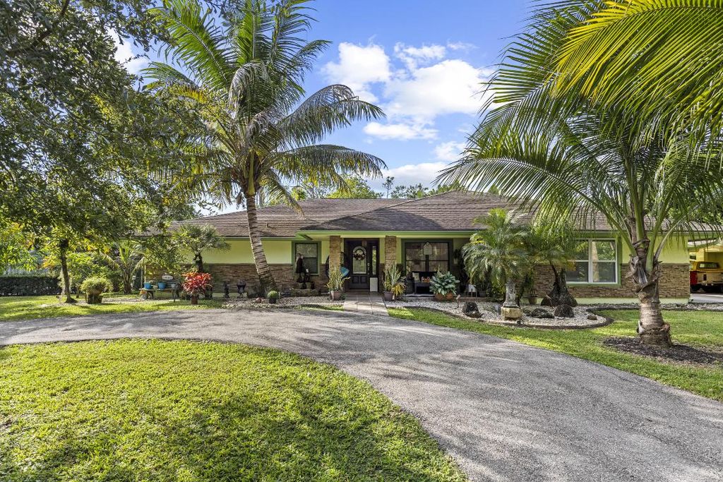 Photo of 6438 Gunclub Road, West Palm Beach, FL 33415 (MLS # R11135647)