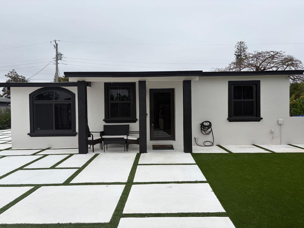 Photo of 1433 NE 53rd Court, Pompano Beach, FL 33064 (MLS # B26004022)